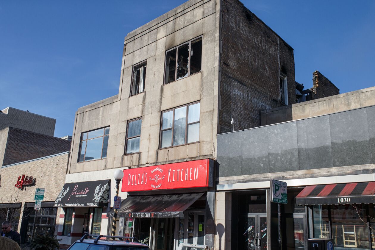 A fire that started Tuesday morning, Nov. 23, 2021 in the building that housed two businesses and four apartments in Oak Park and also damaged other nearby structures.